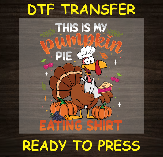 Funny Thanksgiving DTF transfer with turkey chef holding a slice of pumpkin pie and the text "This is My Pumpkin Pie Eating Shirt."