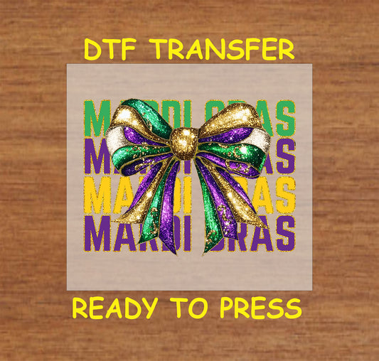 Mardi Gras glitter bow in purple, green, and gold with "Mardi Gras" text in the background.