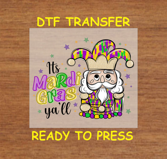 Mardi Gras jester nutcracker DTF transfer with festive colors and beads.