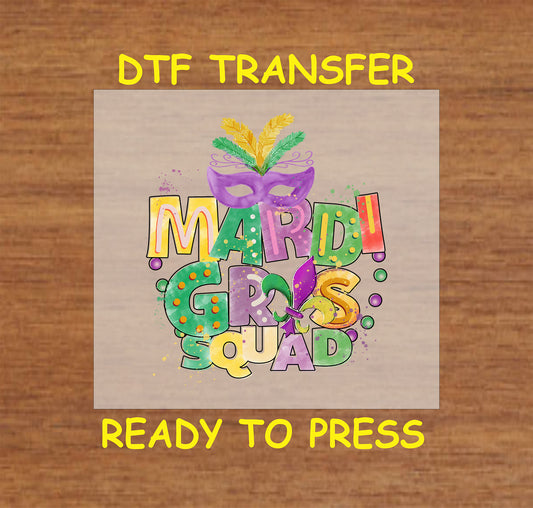 Mardi Gras Squad DTF transfer with colorful text, masquerade mask, feathers, and beads in purple, green, and gold.