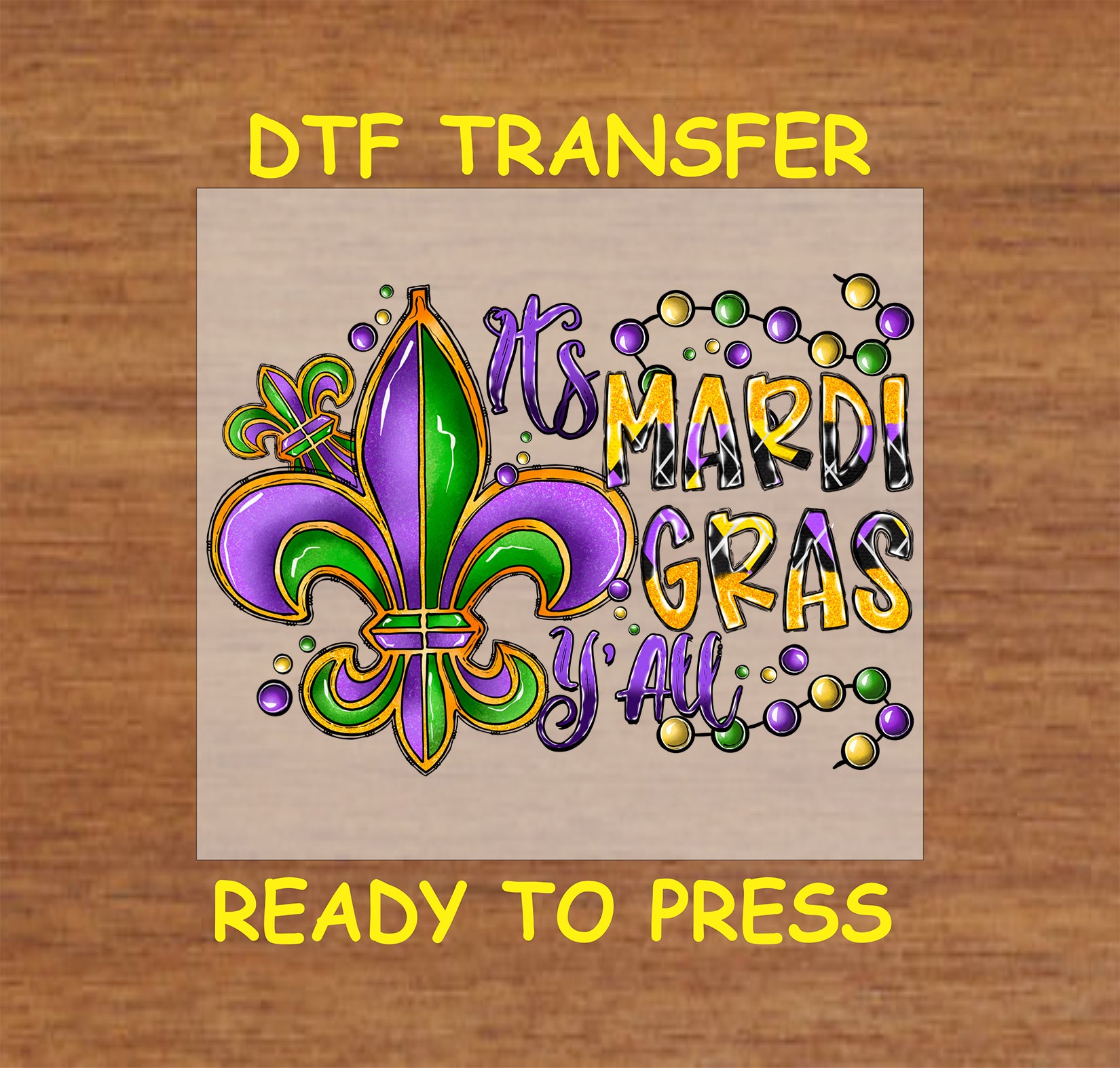 Mardi Gras DTF transfer with a fleur-de-lis, festive beads, and bold lettering.