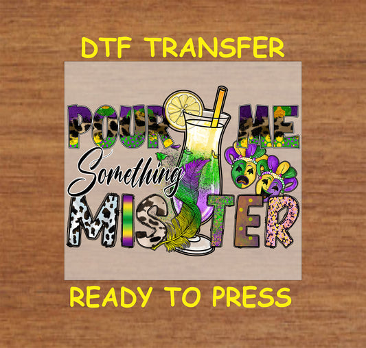 Mardi Gras DTF transfer with bold text, masks, and a colorful cocktail illustration.