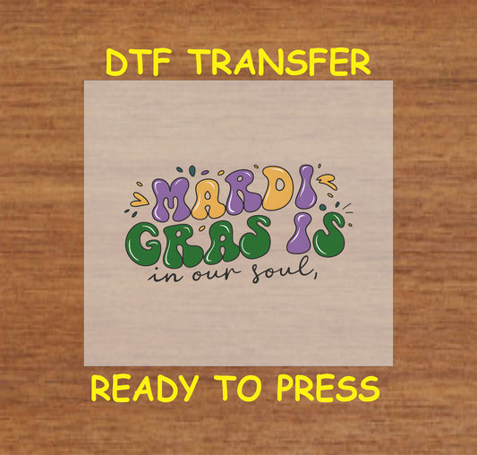 Mardi Gras DTF transfer with colorful text reading "Mardi Gras Is in Our Soul."