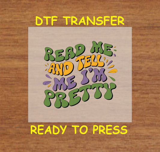 Mardi Gras DTF transfer with colorful text reading "Read Me and Tell Me I’m Pretty."