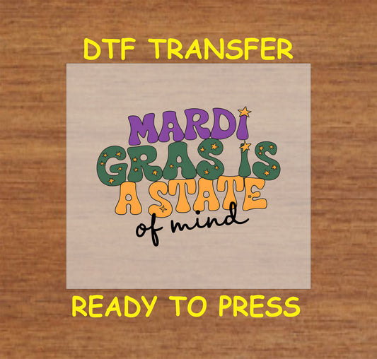 DTF transfer with bold text reading "Mardi Gras Is a State of Mind" in festive colors.