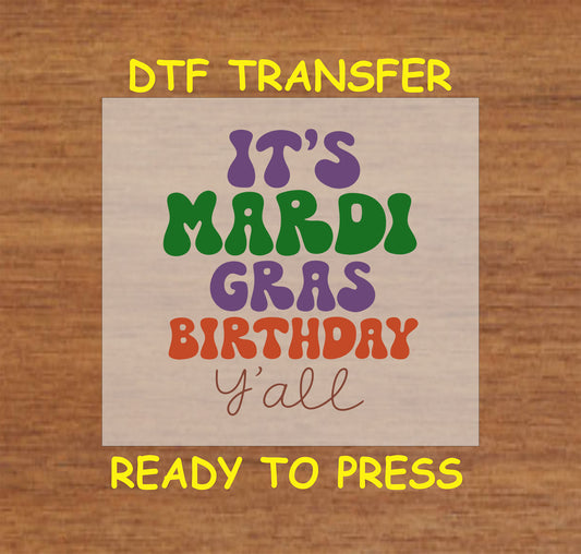 DTF transfer with bold, colorful Mardi-themed birthday text in festive lettering.