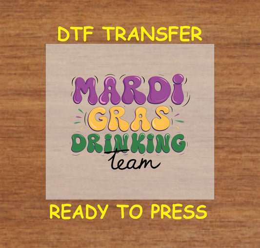 DTF transfer with Mardi Gras Drinking Team text in festive colors.