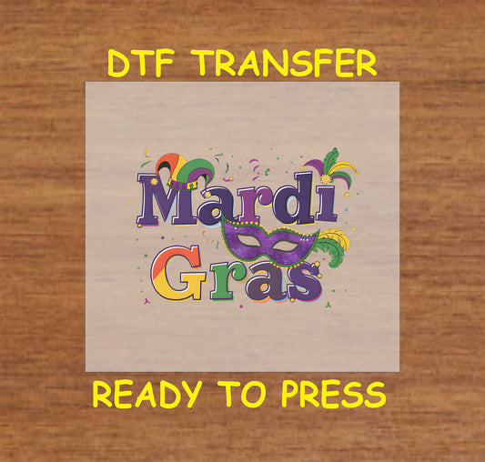 Mardi Gras DTF transfer with mask, feathers, jester hat, and colorful accents.