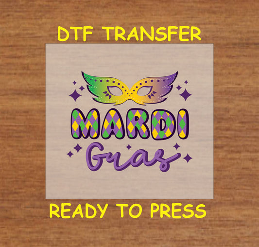 Mardi Gras DTF transfer with a colorful mask and bold lettering.