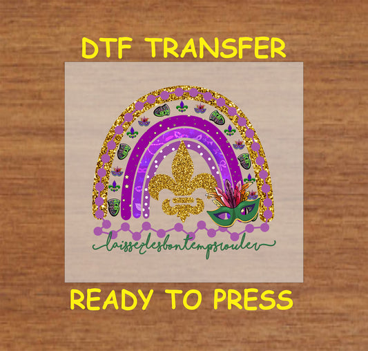 Mardi Gras rainbow DTF transfer with fleur-de-lis, beads, masks, and "Laissez Les Bon Temps Rouler."