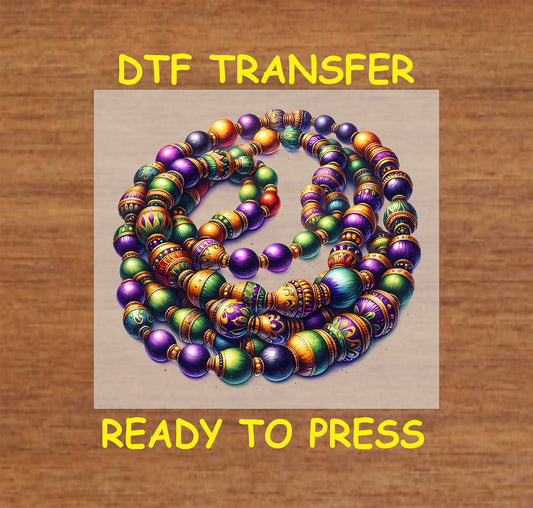 Mardi Gras bead DTF transfer with detailed gold, green, and purple beads.