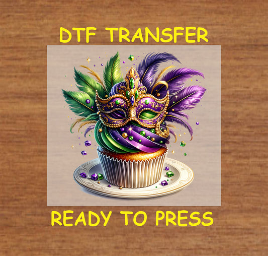 Mardi Gras cupcake DTF transfer with gold mask, feathers, and colorful frosting.