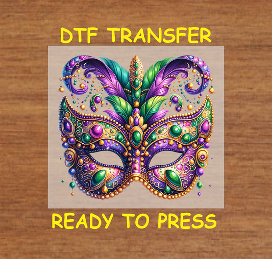 Mardi Gras mask DTF transfer with gold, jewel accents, and colorful feathers.