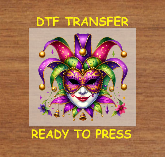 Mardi Gras jester mask DTF transfer with gold, green, and purple accents.