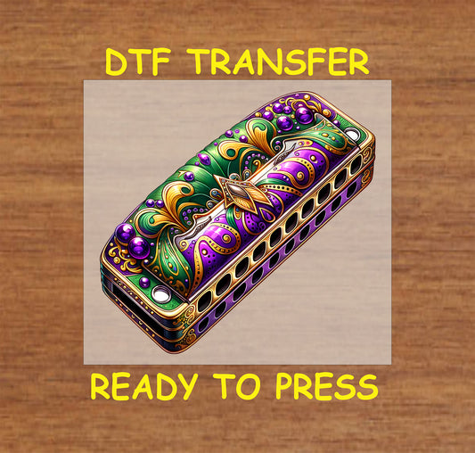 Mardi Gras harmonica in purple, green, and gold with ornate details.