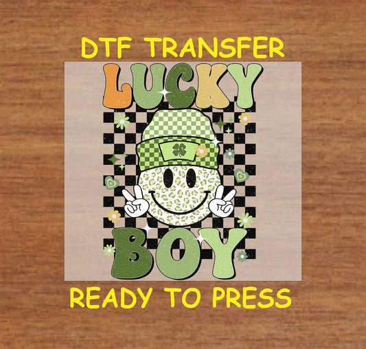 Lucky Boy St. Patrick’s Day DTF transfer with checkered background and clovers.