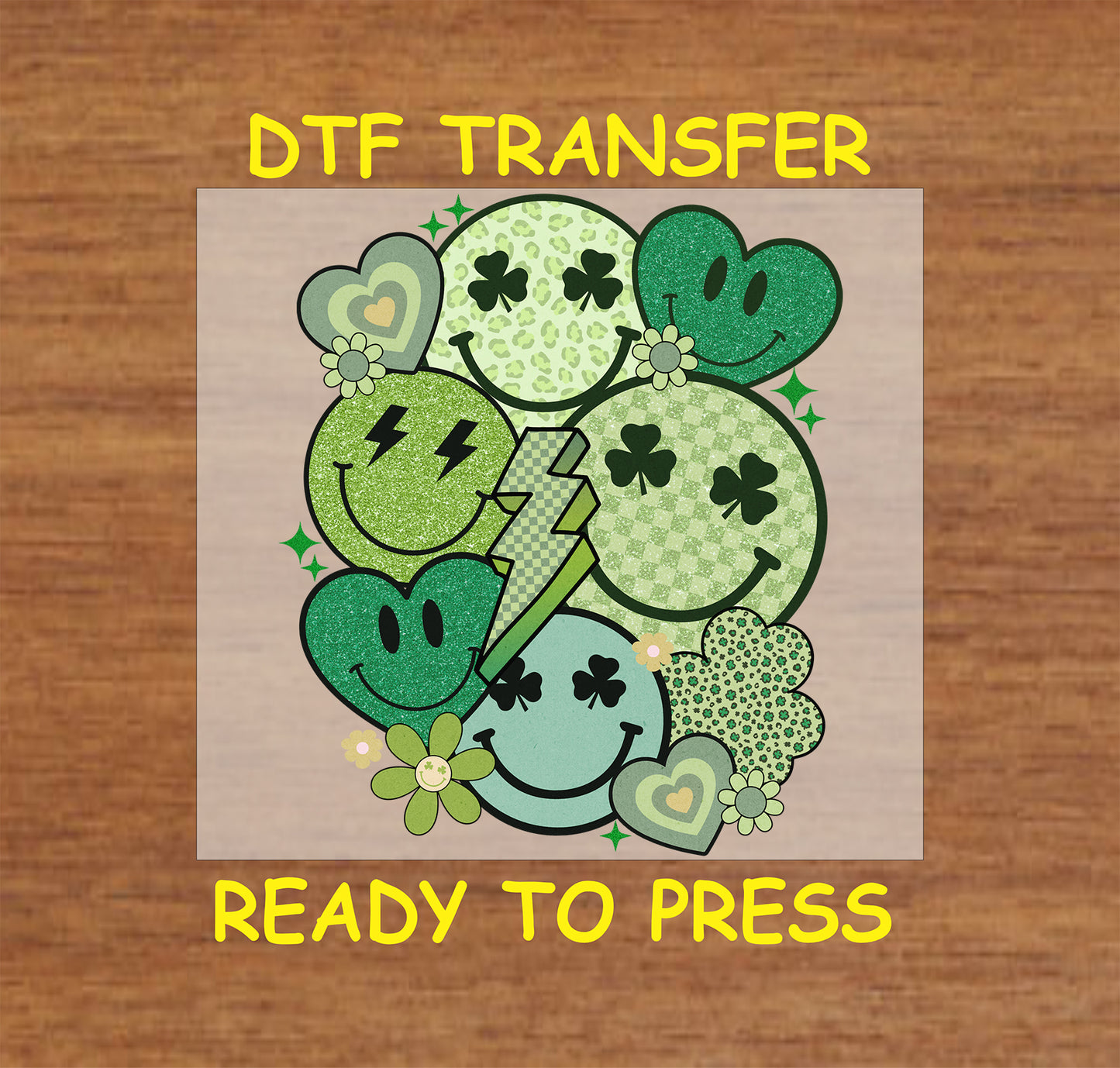 St. Patrick’s Day DTF transfer with green smiley faces, shamrocks, and a lightning bolt.