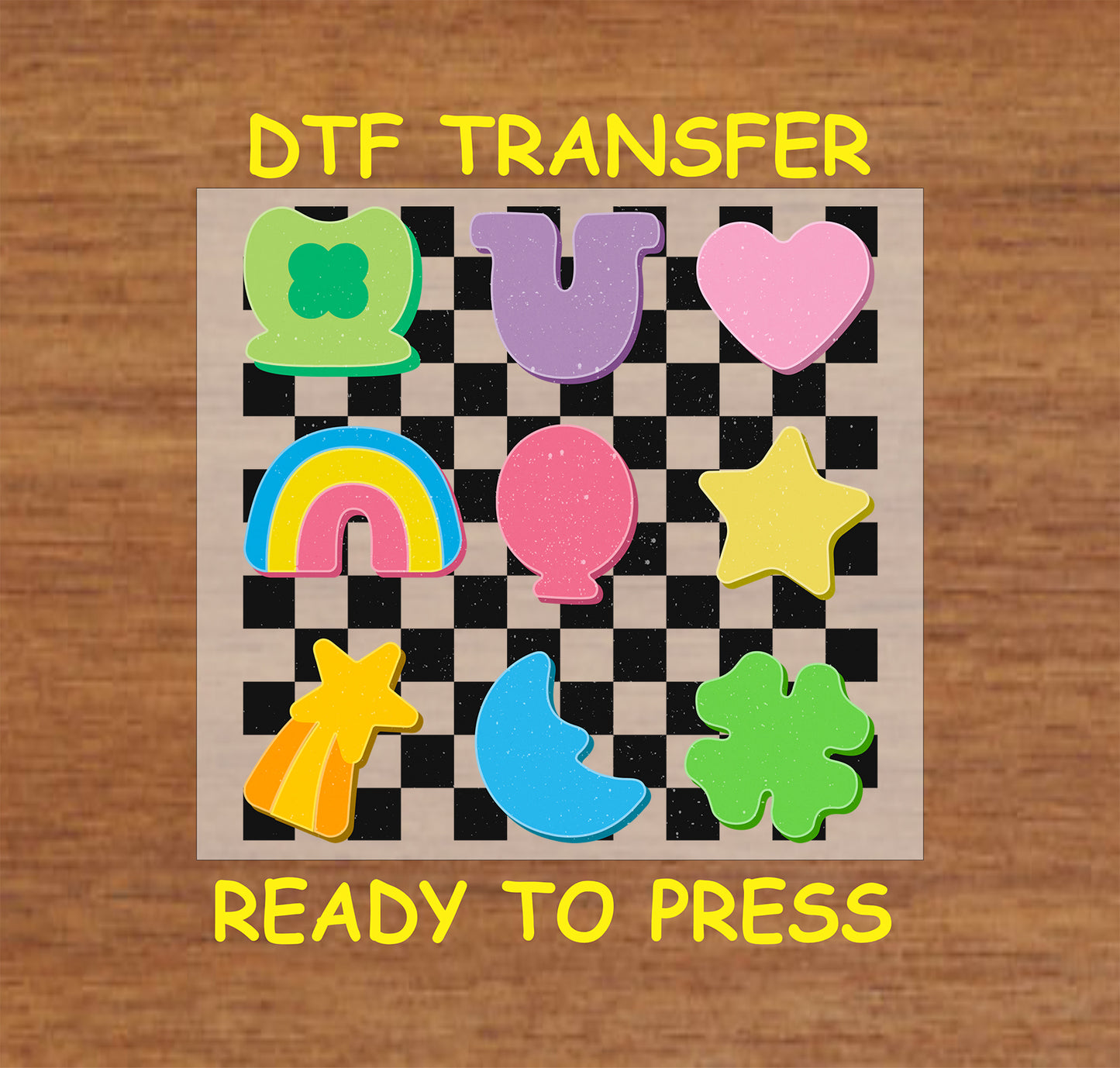 St. Patrick’s Day DTF transfer with a checkerboard background and colorful shapes, including a clover, moon, rainbow, and stars.