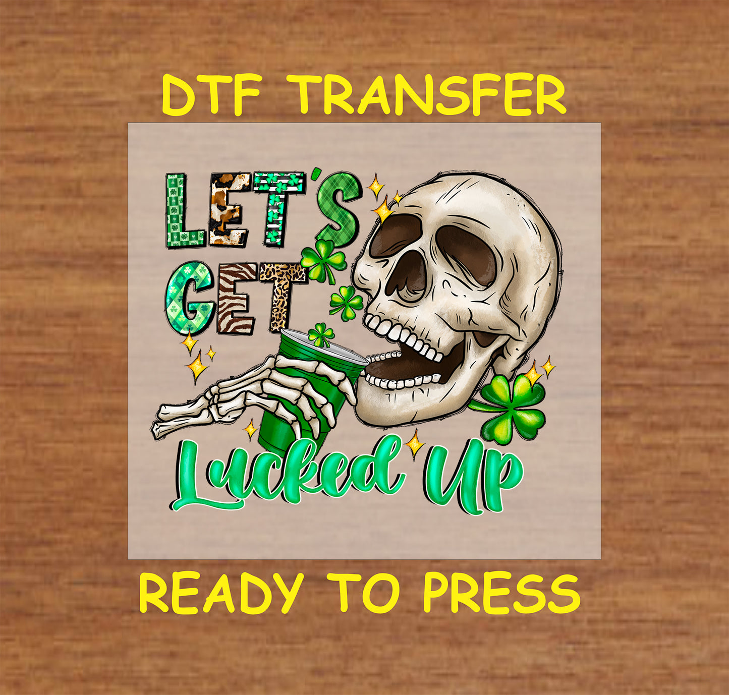 St. Patrick’s Day Let’s Get Lucked Up DTF transfer with a skeleton, shamrocks, and a green drink.