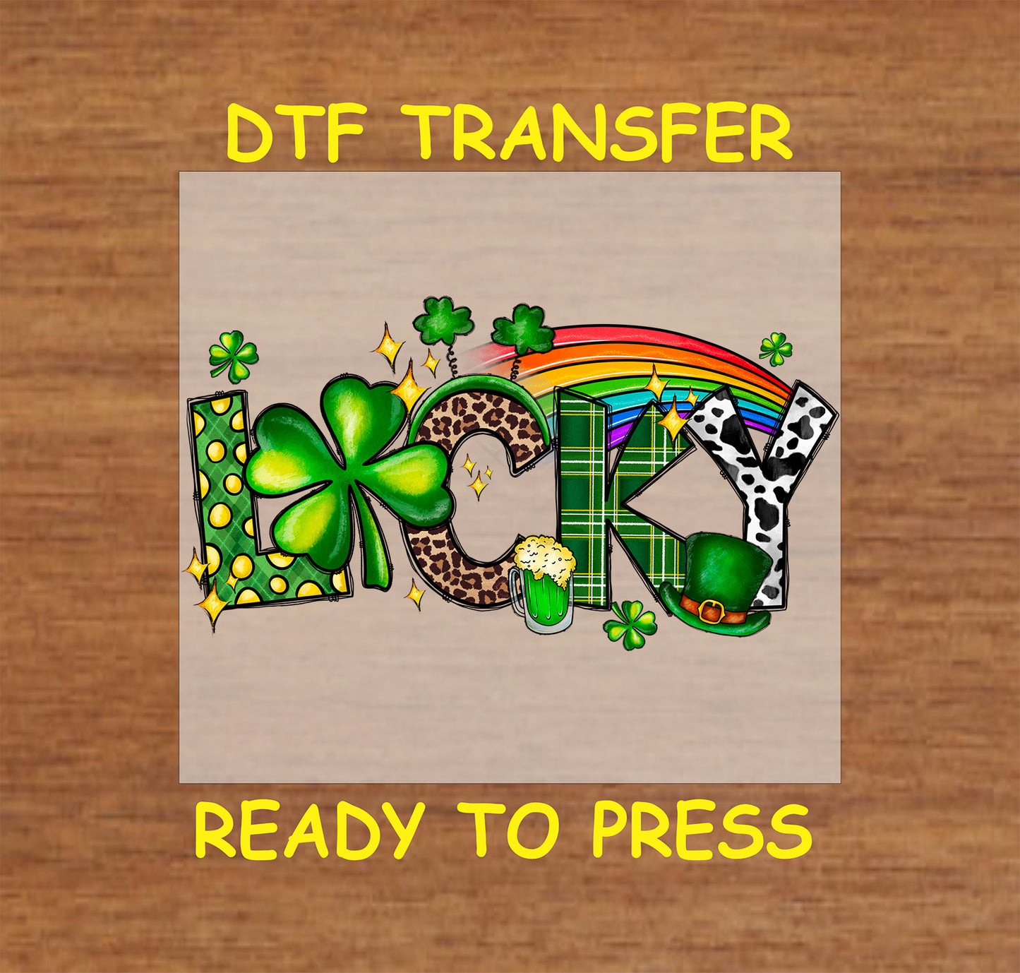 St. Patrick’s Day DTF transfer with "Lucky" text, shamrock, rainbow, gold coins, and a beer mug.