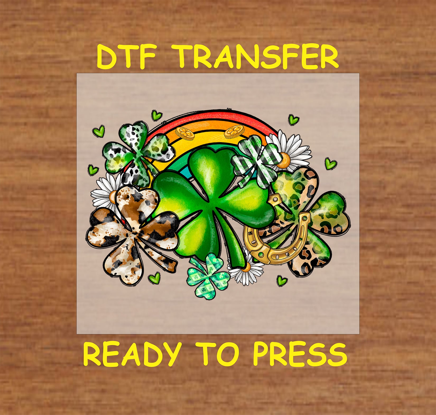 St. Patrick’s Day DTF transfer with shamrocks, a horseshoe, gold coins, and a rainbow.