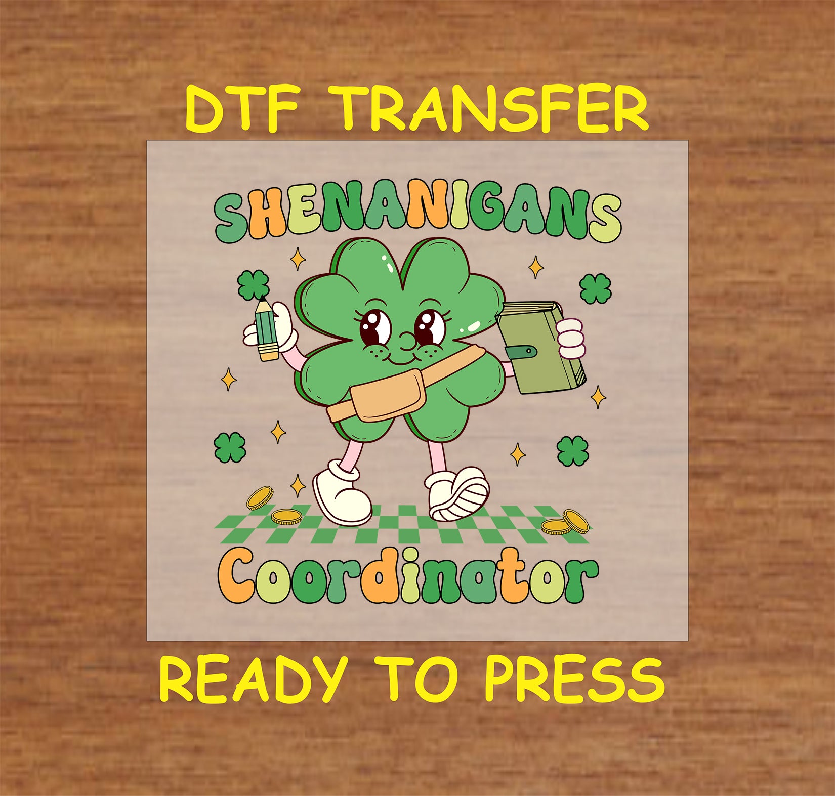 Shenanigans Coordinator St. Patrick’s Day DTF transfer with a cute shamrock character holding a clipboard and drink.