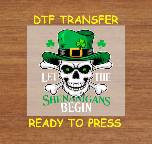 Let the Shenanigans Begin St. Patrick’s Day DTF transfer with skull, leprechaun hat, and shamrocks.