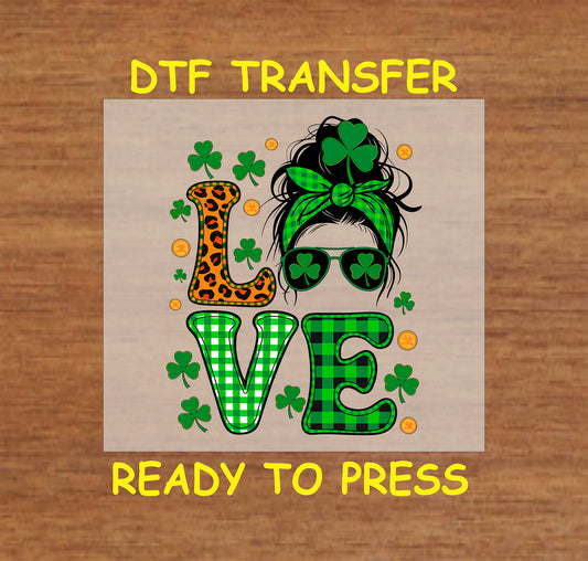 Love St. Patrick’s Day DTF transfer with leopard print, plaid, shamrocks, and messy bun.