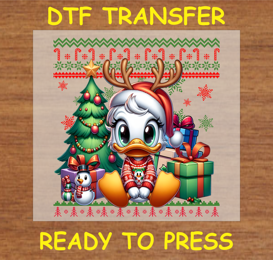 Duck in holiday sweater with reindeer antlers and Santa hat, surrounded by Christmas tree, gifts, and festive decorations DTF transfer.