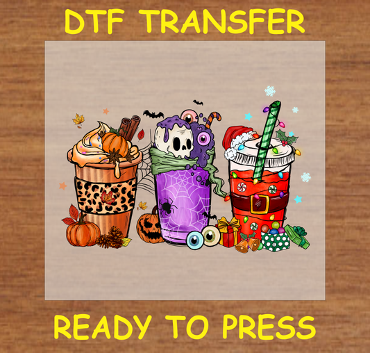 HalloThanksMas-themed mugs featuring Halloween, Thanksgiving, and Christmas designs, ready to press DTF transfer.