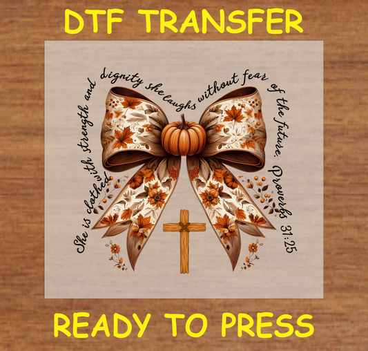 Proverbs 31:25 floral pumpkin bow DTF transfer with autumn leaves and a cross.