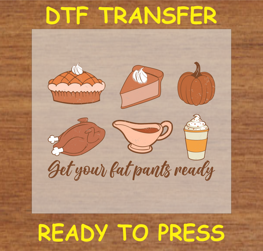 Thanksgiving DTF transfer with the text "Get Your Fat Pants Ready" and images of pie, turkey, pumpkin, and gravy.