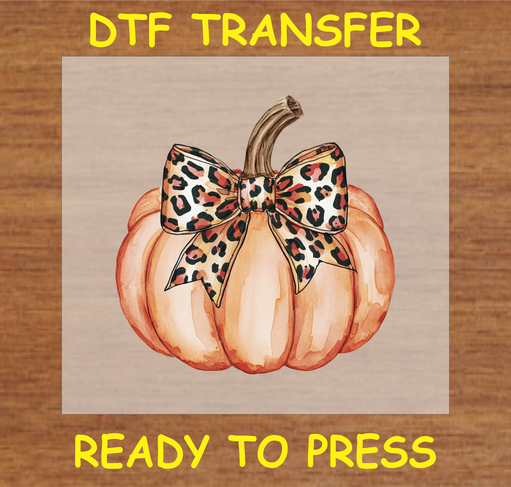 Pumpkin DTF transfer with a leopard print bow, perfect for fall-themed apparel.