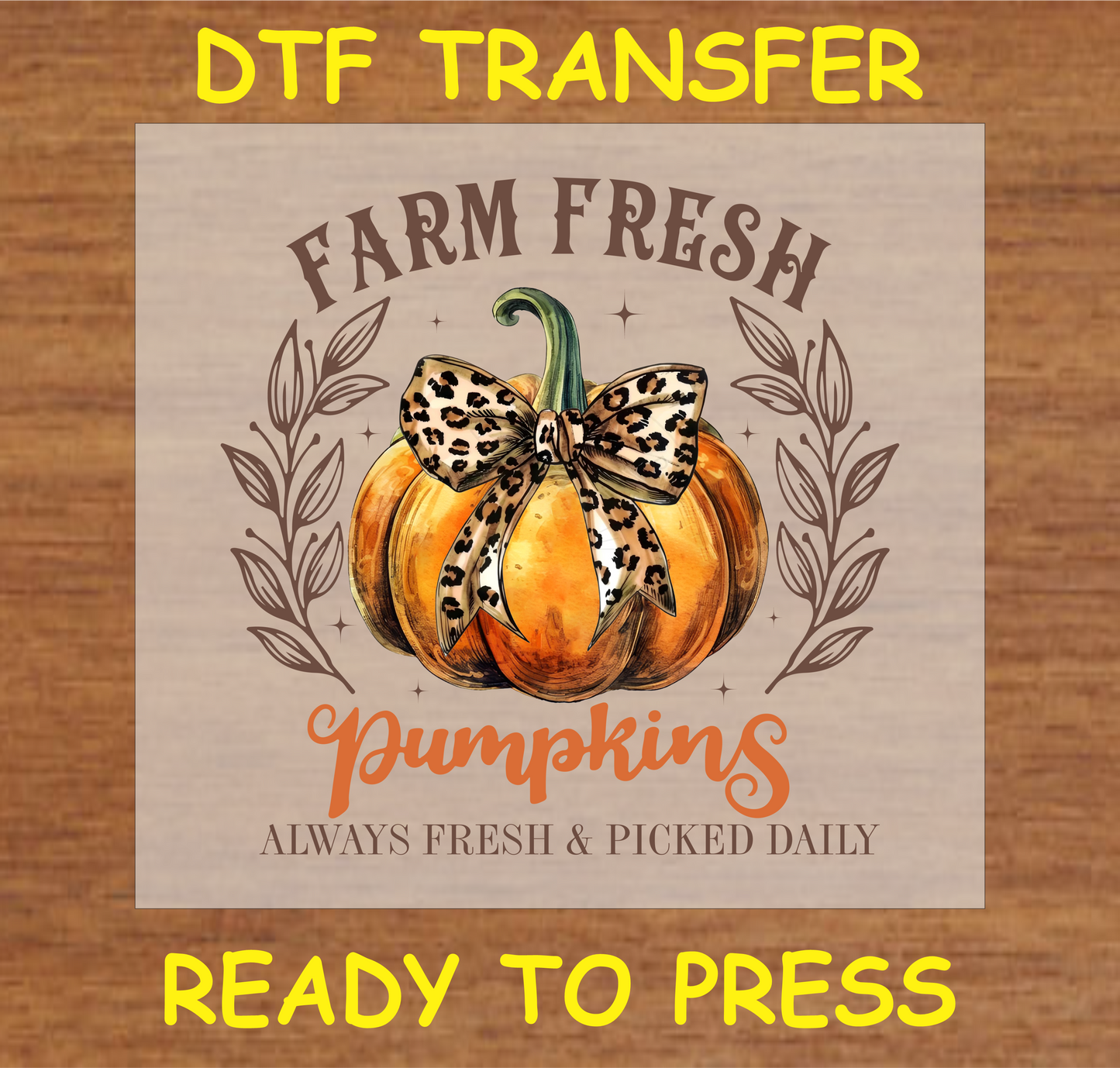 Farm Fresh Pumpkins DTF transfer featuring a pumpkin with a leopard-print bow and fall foliage, perfect for autumn-themed custom apparel.