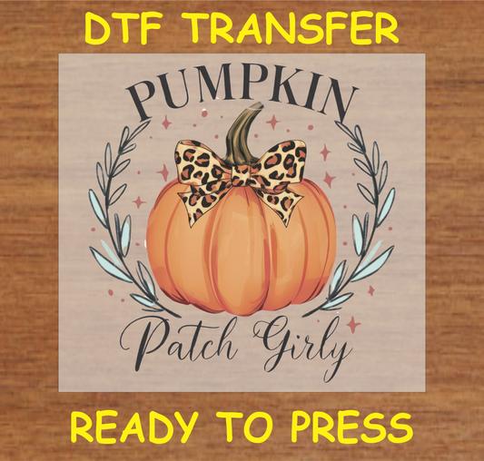 Pumpkin Patch Girly DTF transfer with a leopard print bow, surrounded by autumn foliage, ready to press.