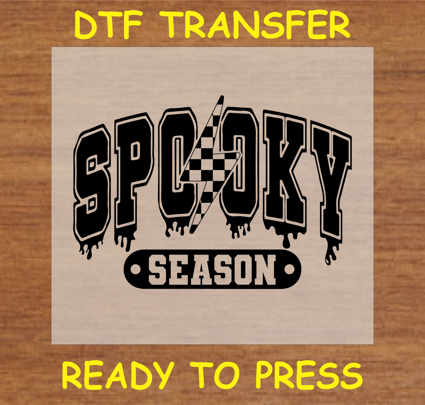 "Spooky Season DTF Transfer with black font and checkered lightning bolt design for Halloween"