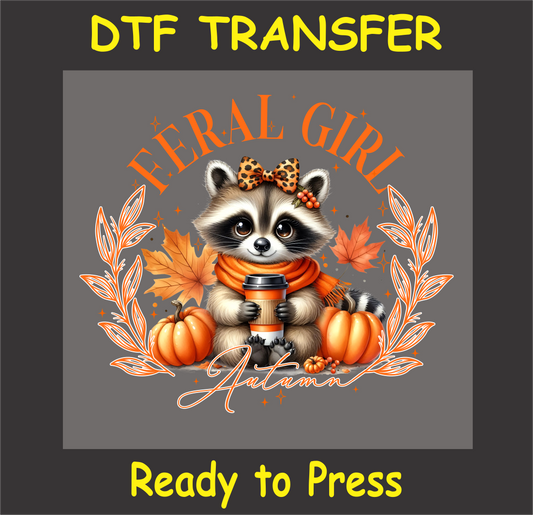 "Feral Girl Autumn DTF Transfer featuring a cute animal holding coffee, with pumpkins and fall leaves"