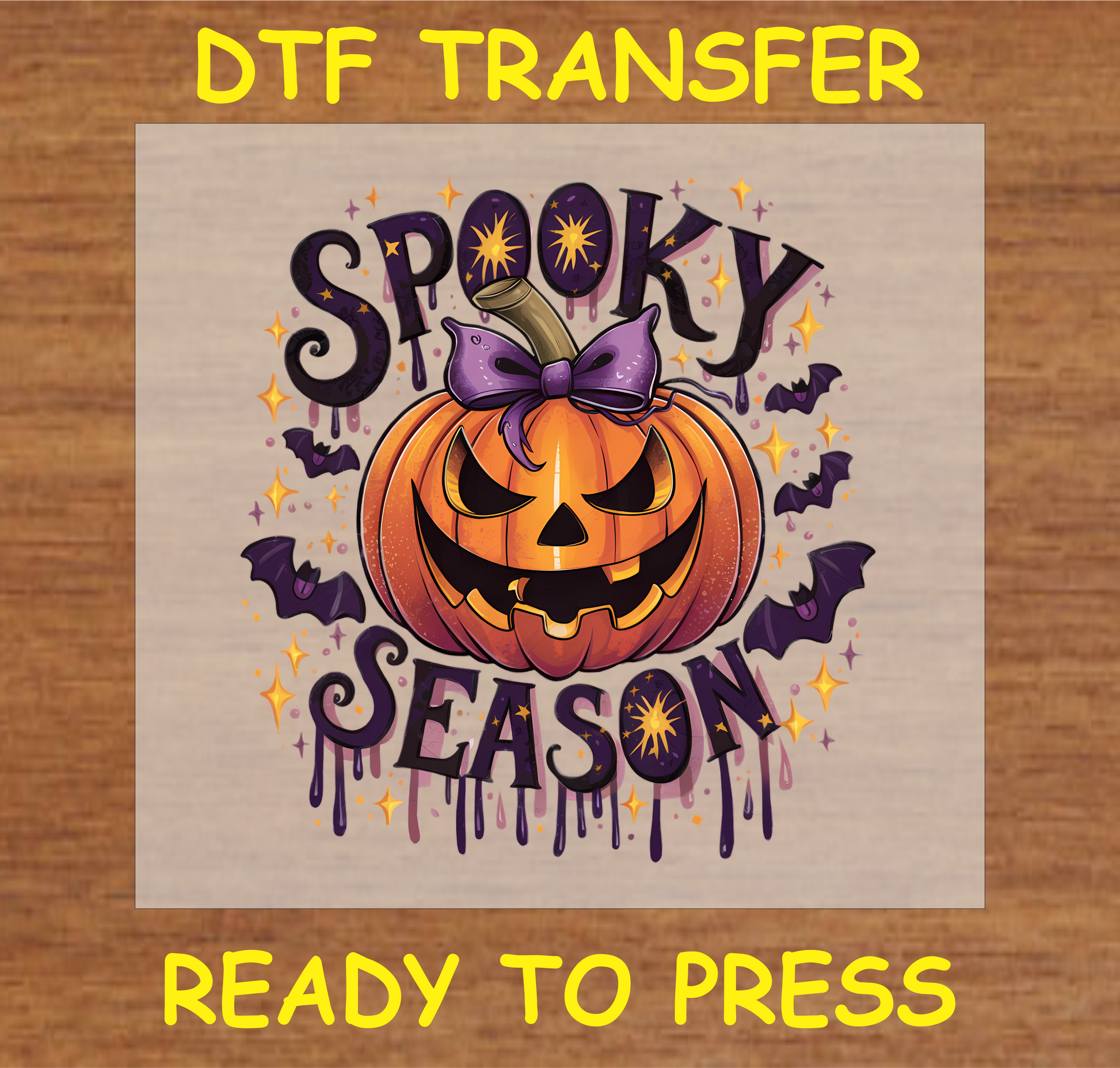 "Spooky Season DTF Transfer featuring a jack-o'-lantern with bats and purple bow for Halloween"