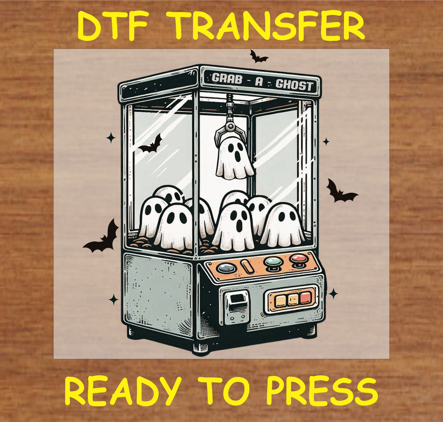 "Grab-a-Ghost DTF Transfer featuring a claw machine with ghosts for a fun Halloween design"