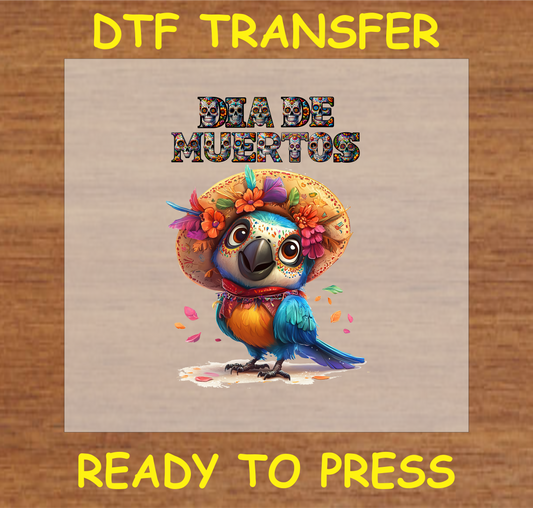 "Día de Muertos DTF Transfer with a colorful parrot in a traditional Mexican hat adorned with flowers"