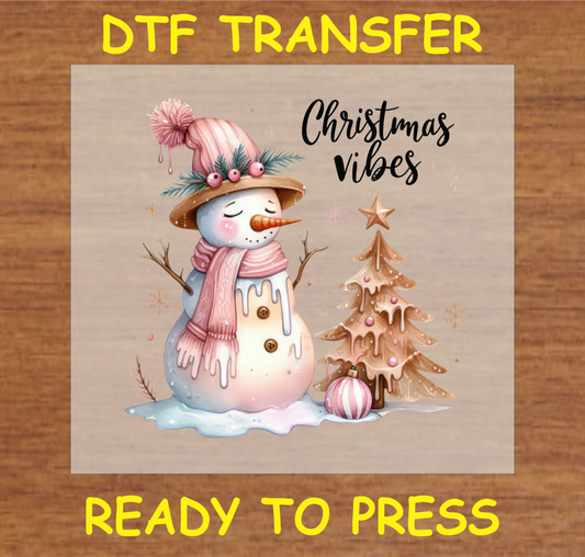 "Christmas Vibes DTF transfer featuring a cute snowman and festive tree design for winter holiday projects"