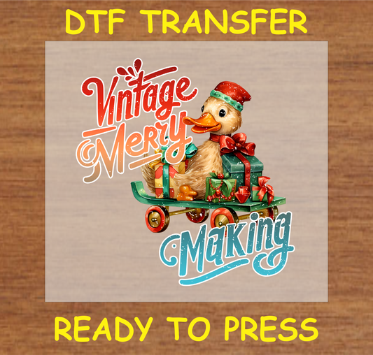 "Vintage Christmas DTF transfer with a festive duck and presents for holiday custom projects"