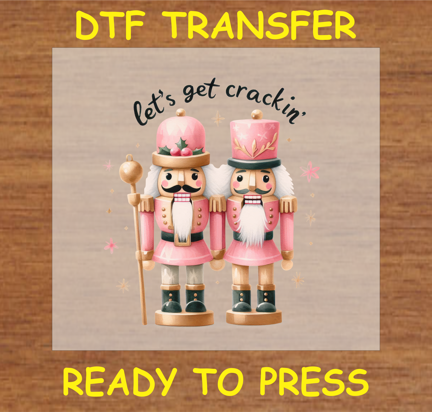 "Let's Get Crackin' Nutcracker DTF Transfer featuring two pink nutcrackers for holiday fabric projects"