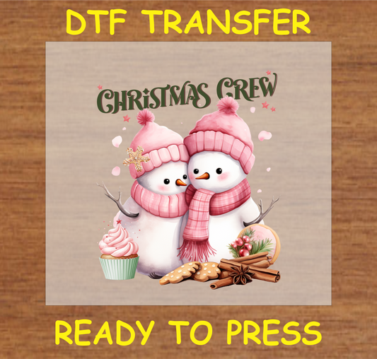 "Christmas Crew DTF Transfer featuring two cute snowmen with holiday treats and decorations"