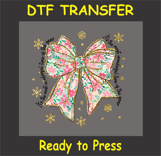 "Floral bow Christmas DTF Transfer with 'Most Wonderful Time of the Year' text and glitter accents"