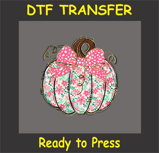 "Pumpkin DTF transfer with pink bow and floral accents for fall and holiday projects"