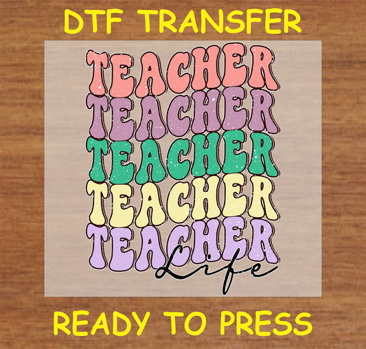 "Teacher Life DTF Transfer with colorful repeated 'Teacher' text"