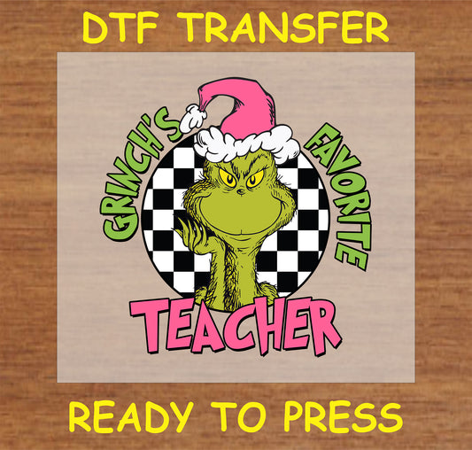 "Favorite Teacher Holiday DTF Transfer with festive character in Santa hat and checkered background for teachers"