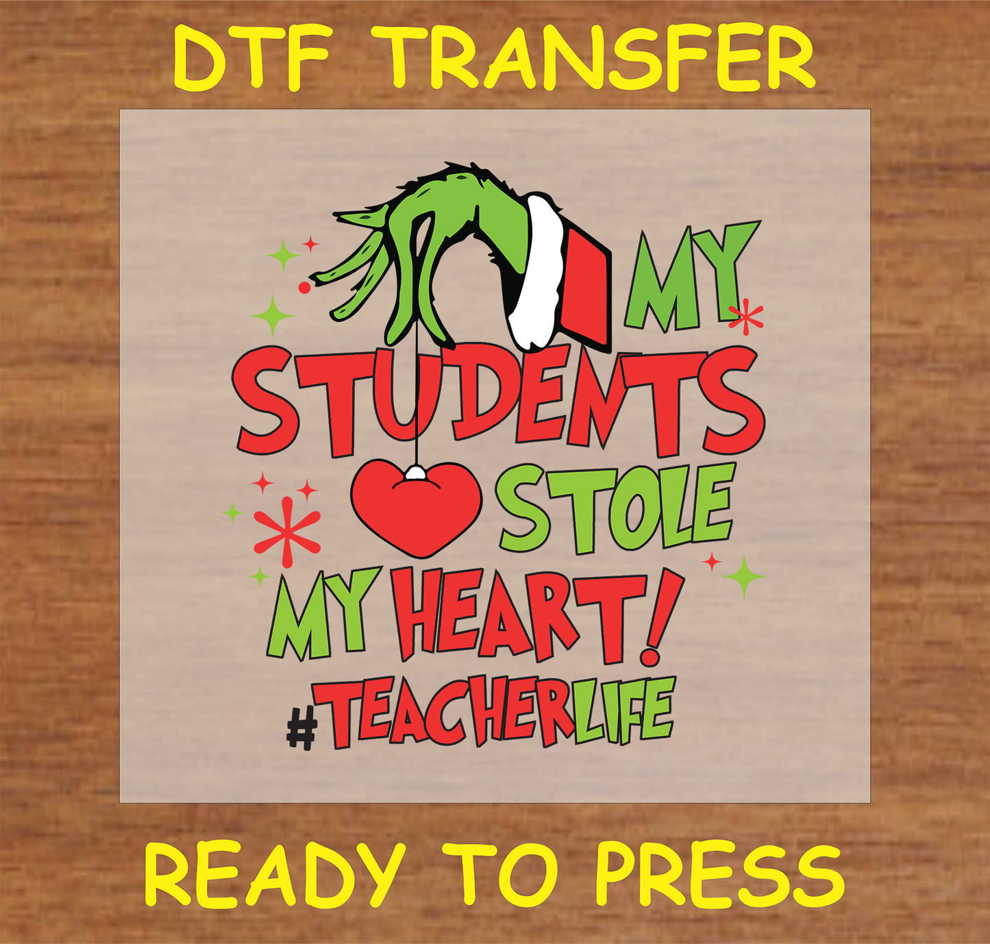 "My Students Stole My Heart DTF Transfer with festive hand holding a heart ornament and colorful text for teachers"