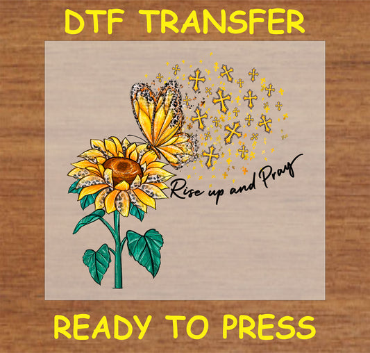 "Rise Up and Pray DTF Transfer featuring a sunflower and butterfly design for motivational projects"